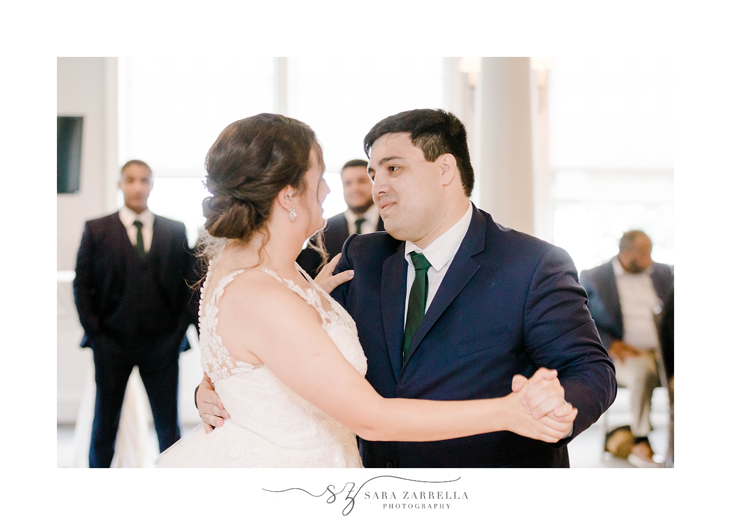 bride and groom have first dance during reception at Harbor Lights