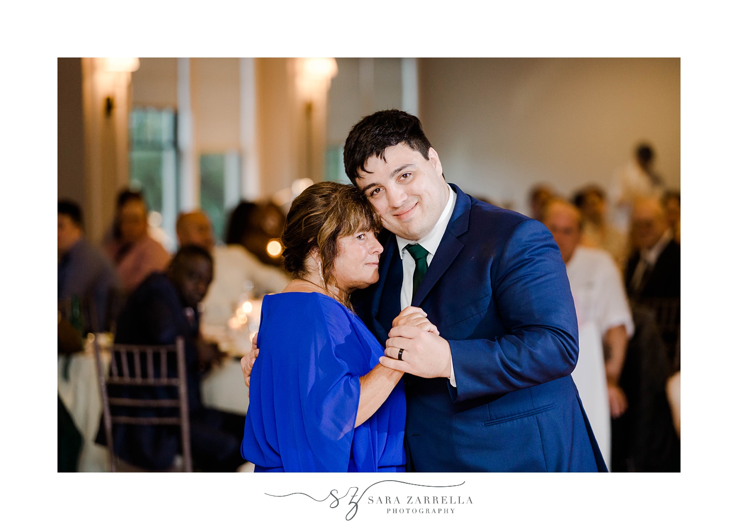 groom and mom hug during dance at Warwick RI wedding reception 