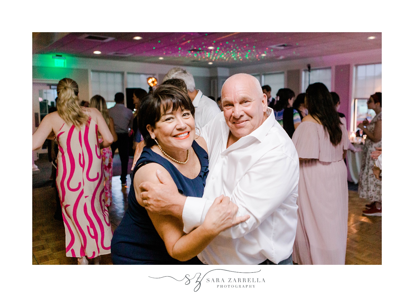 guests dance during Harbor Lights wedding reception 