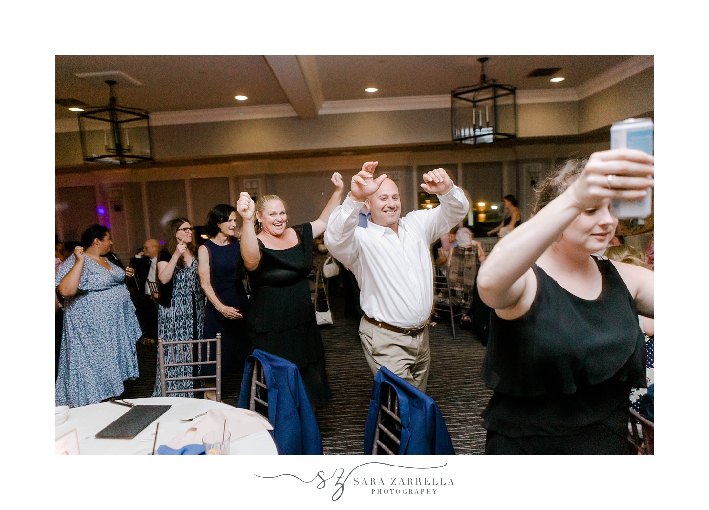 guests dance during Harbor Lights wedding reception 