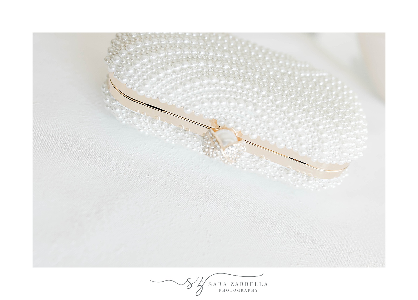 white beaded clutch for bride