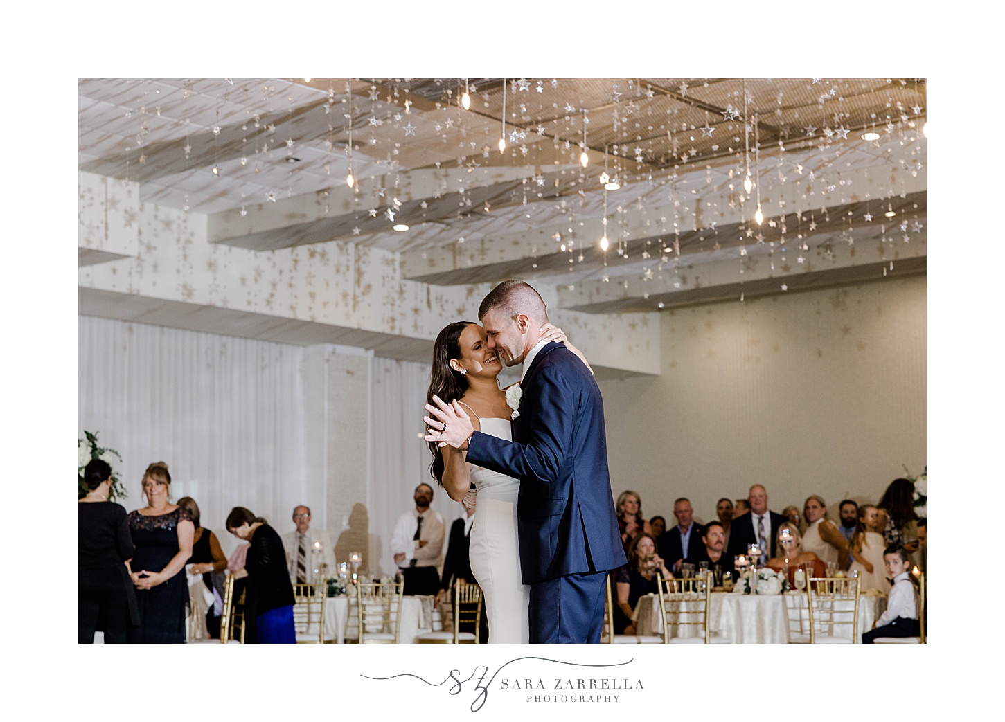 newlyweds dance close together on floor at the Wyndham Newport Hotel