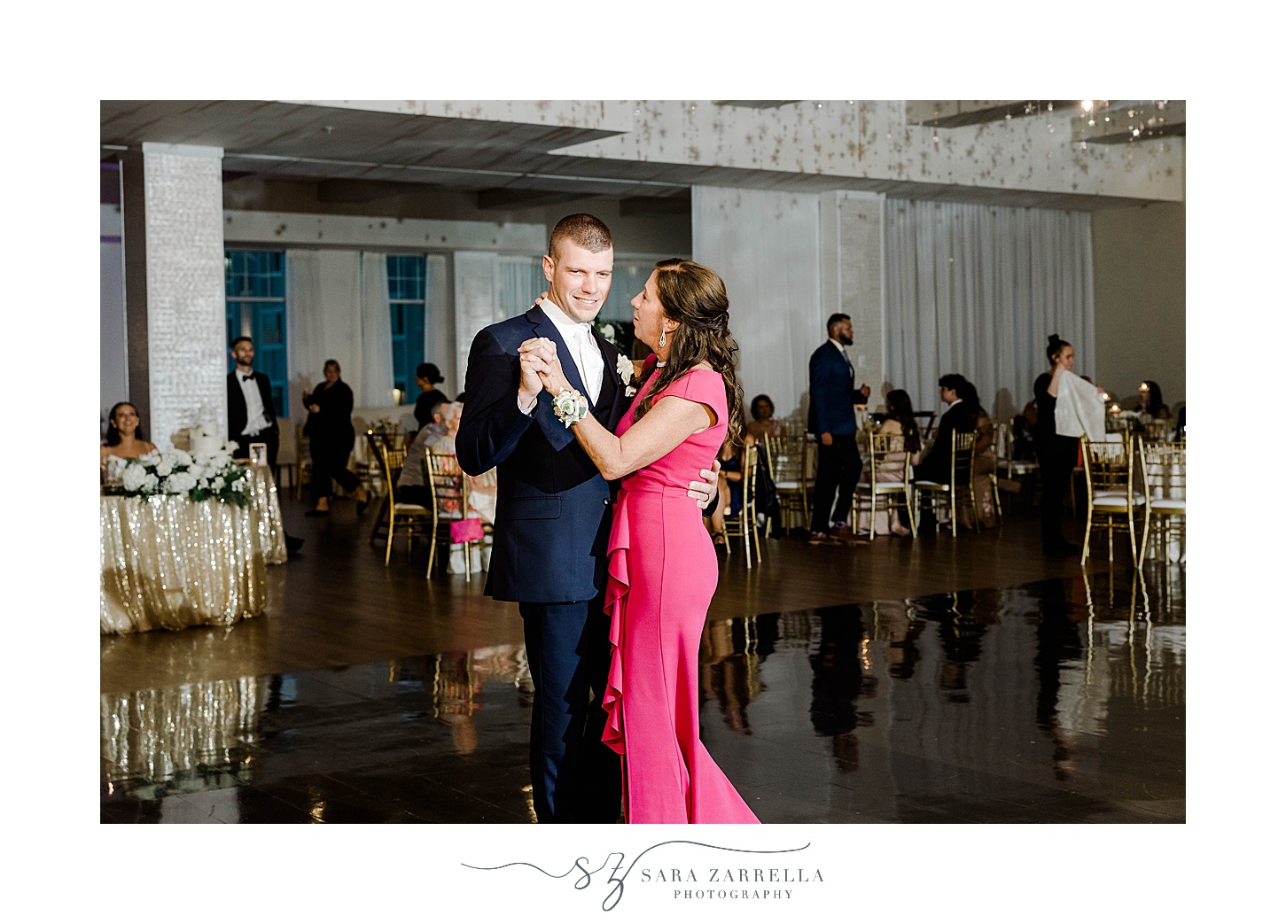 groom dances with mom in pink gown at the Wyndham Newport Hotel wedding reception 