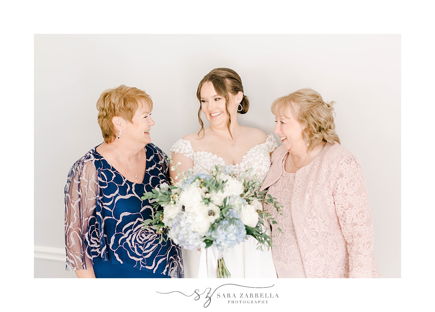 bride laughs with grandmother and mother before wedding at Newport Harbor Island Resort