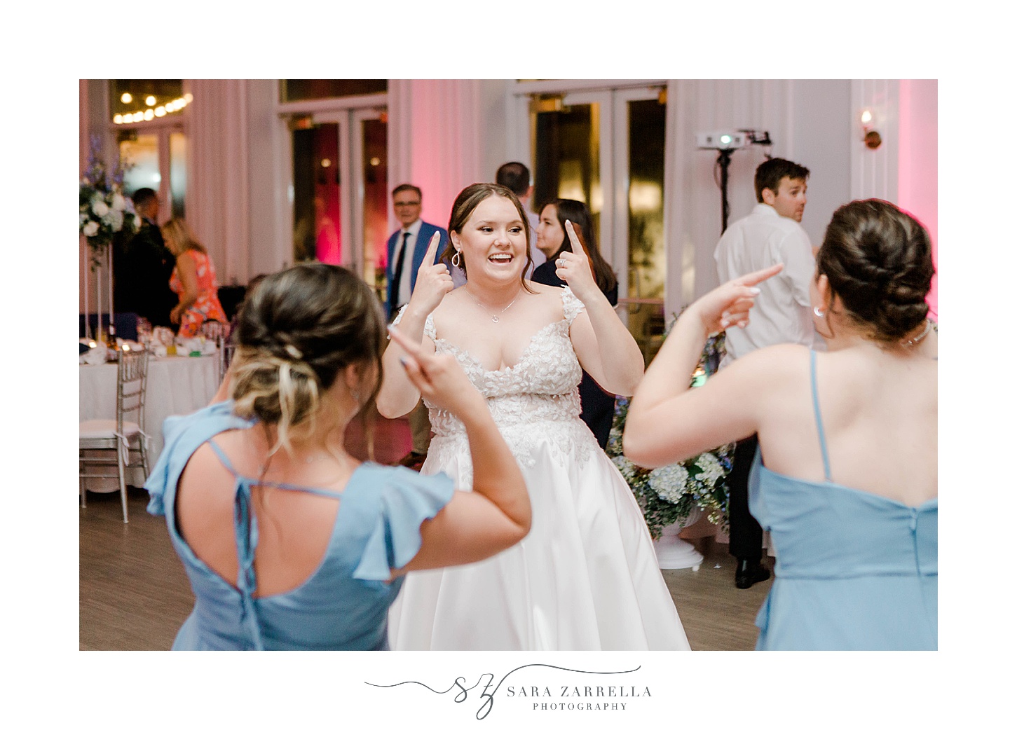 guests dance during Newport wedding reception party