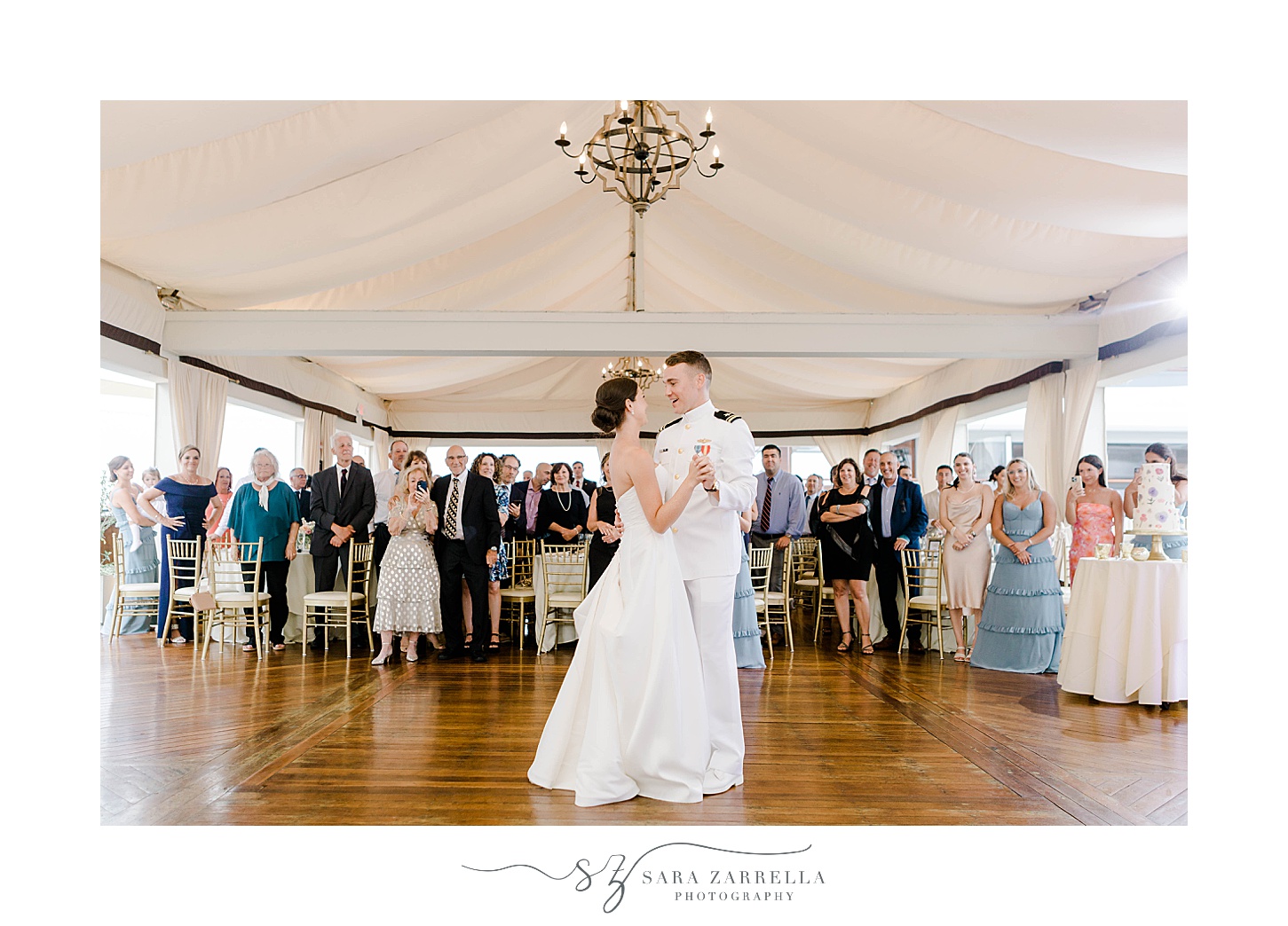 newlyweds dance together during Regatta Place wedding reception