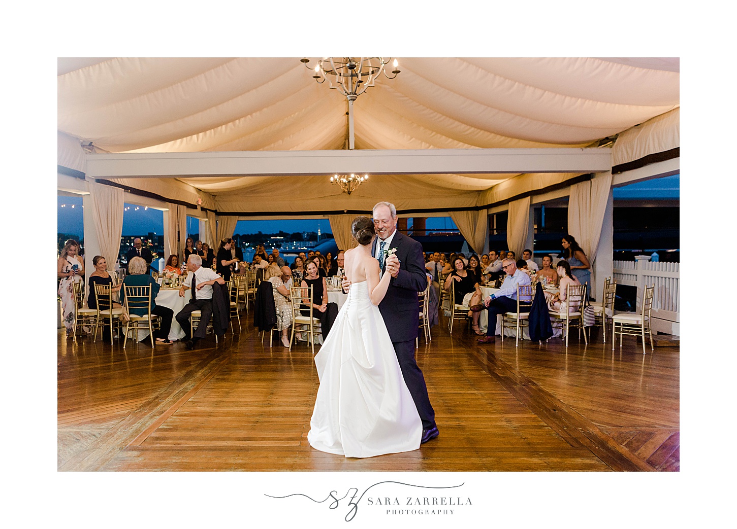 bride and father dance together during Regatta Place wedding reception