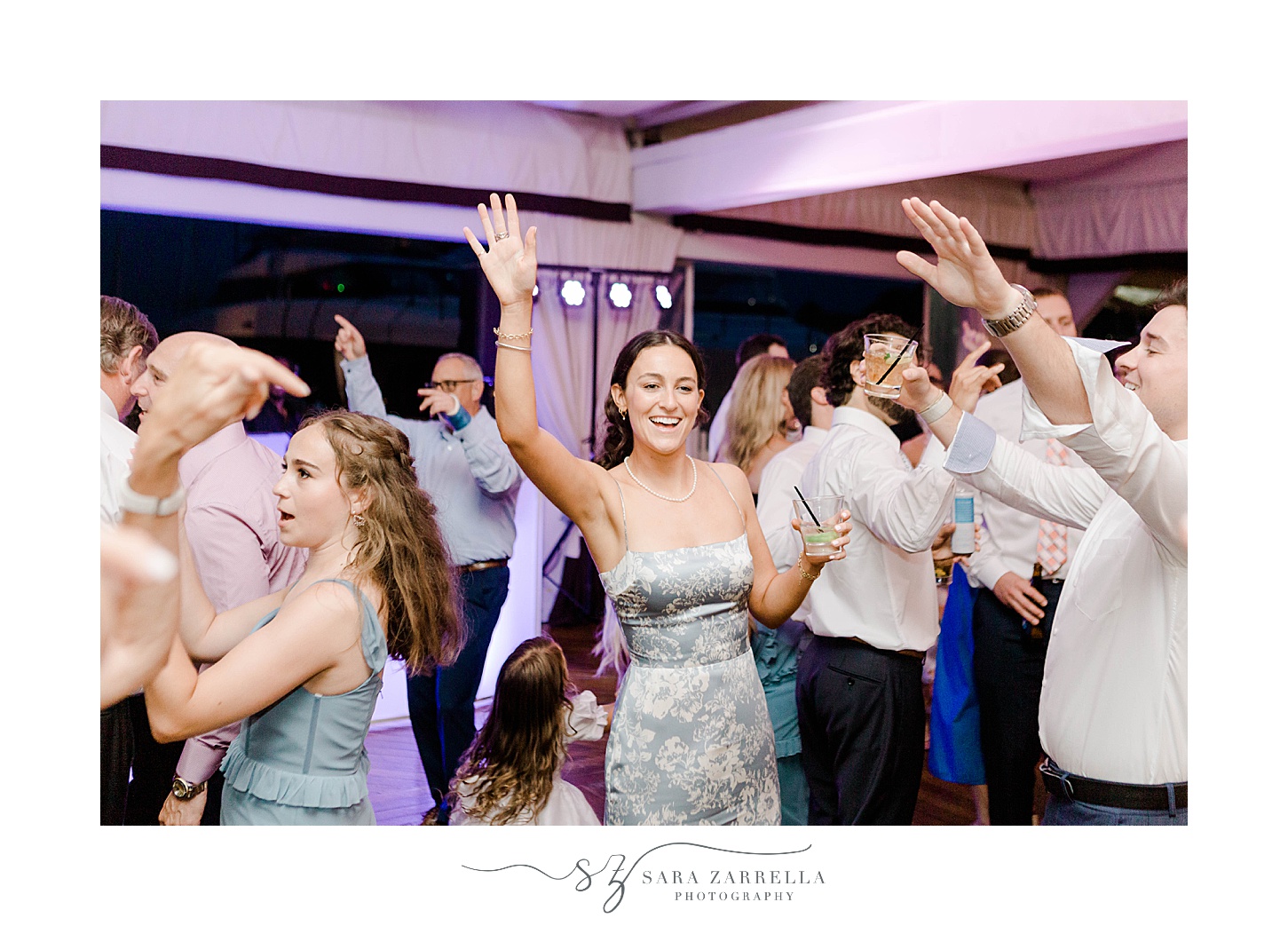 guests dance during Regatta Place wedding reception