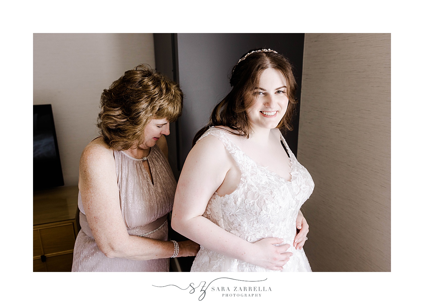 mother helps bride into wedding dress before Bridgerton inspired wedding at Newport Harbor Island Resort