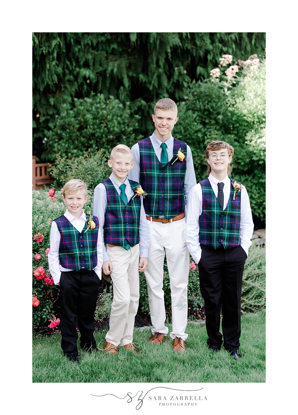 four boys in plaid vests stand on lawn at Pleasant Valley Country Club