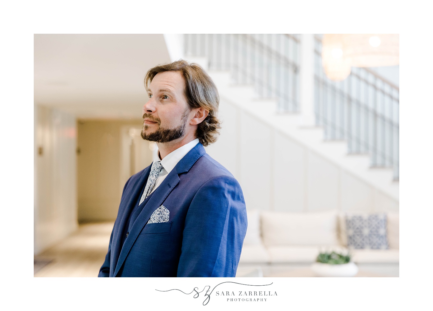 groom waits inside Newport RI venue for bride during first look 