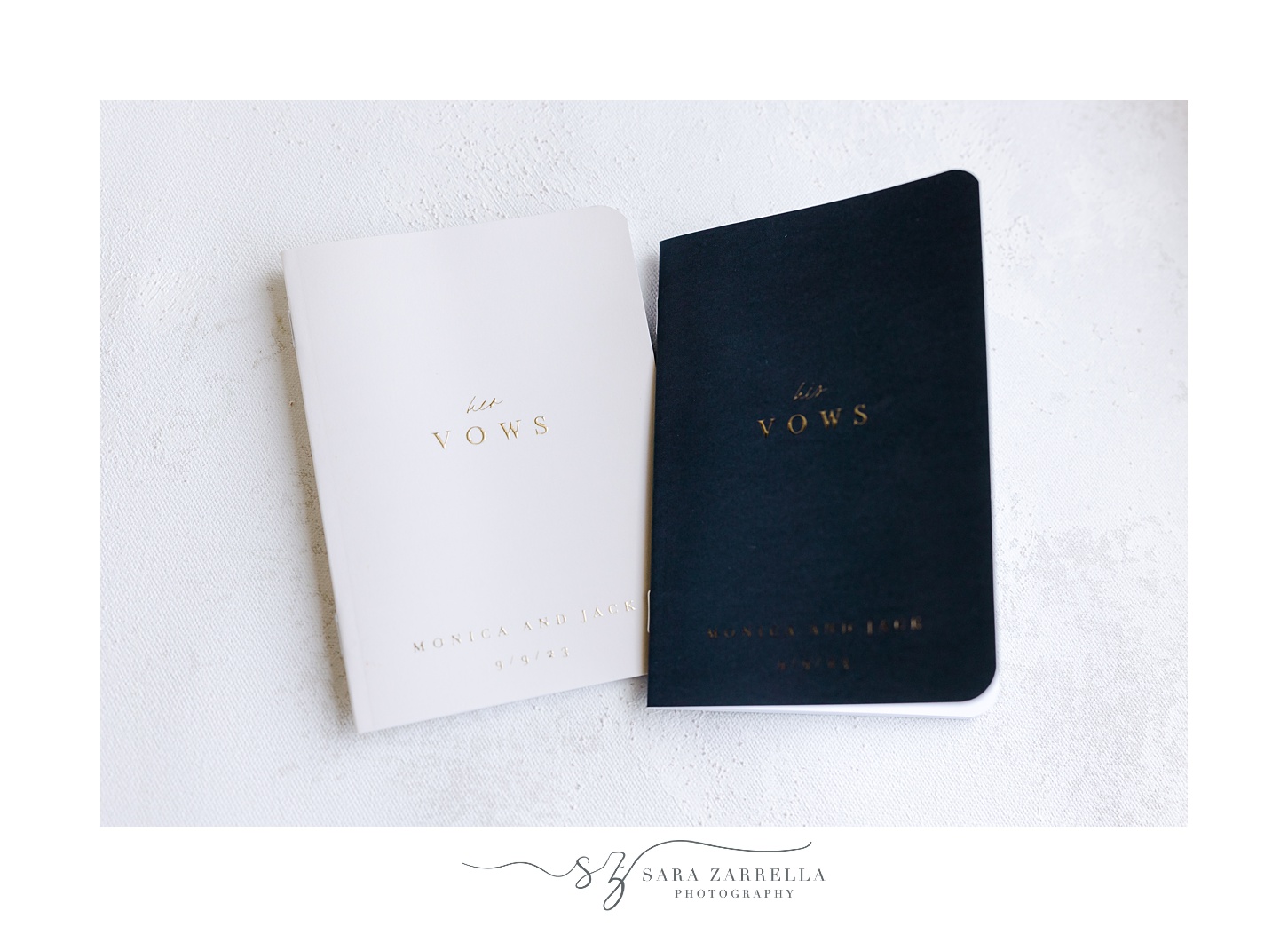 black and white vow booklets with gold embossing 