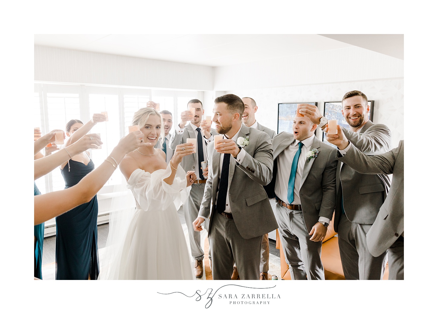 bride and groom take shots with wedding party before wedding