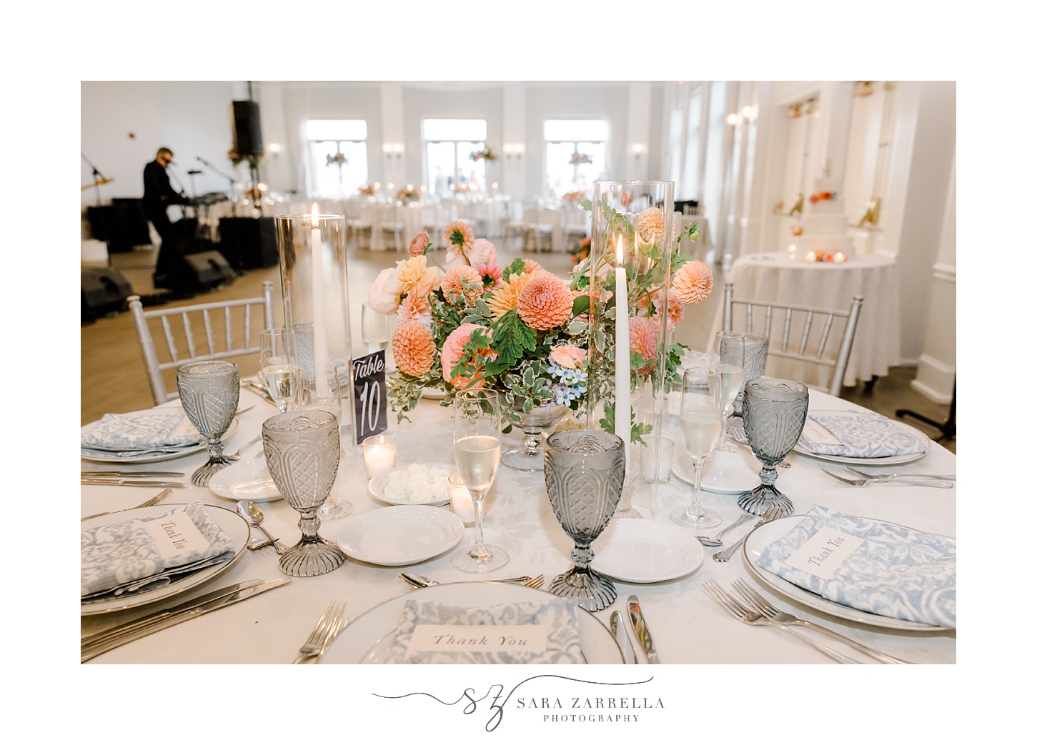 coastal inspired wedding reception at Newport Harbor Island Resort with blue glassware 