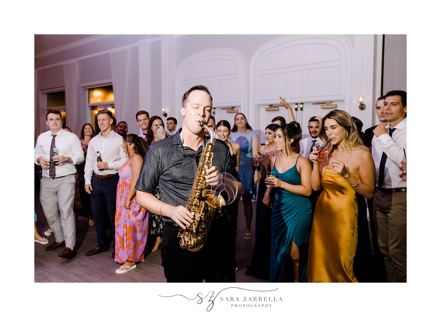 live saxophone player performs during Newport RI wedding reception 