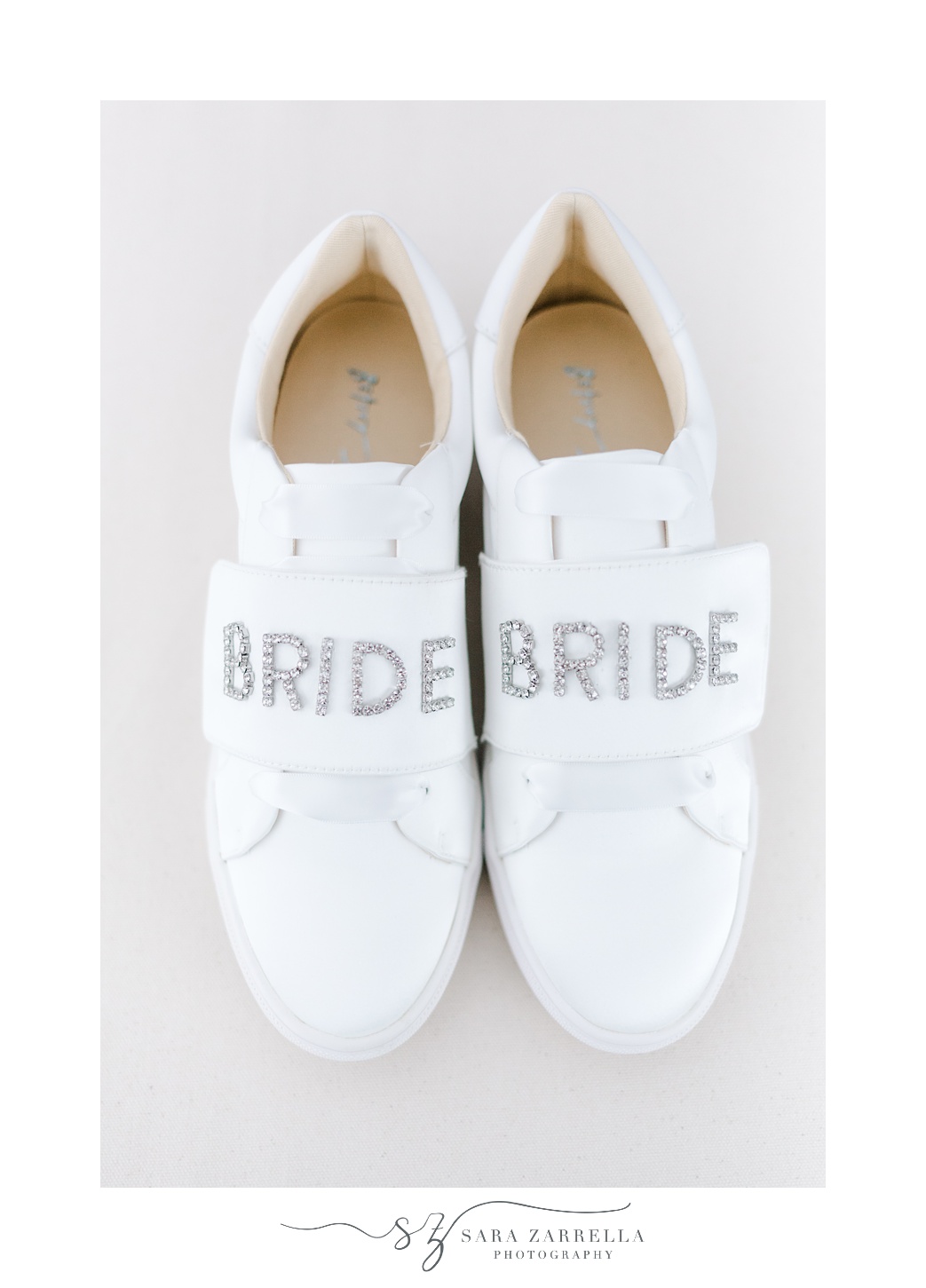 bride's tennis shoes with bedazzled BRIDE on strap