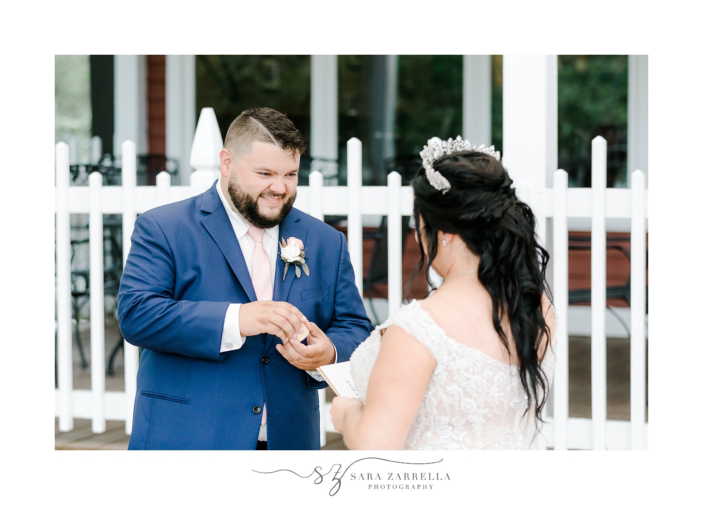 groom gives bride a gift on Blissful Meadows wedding day