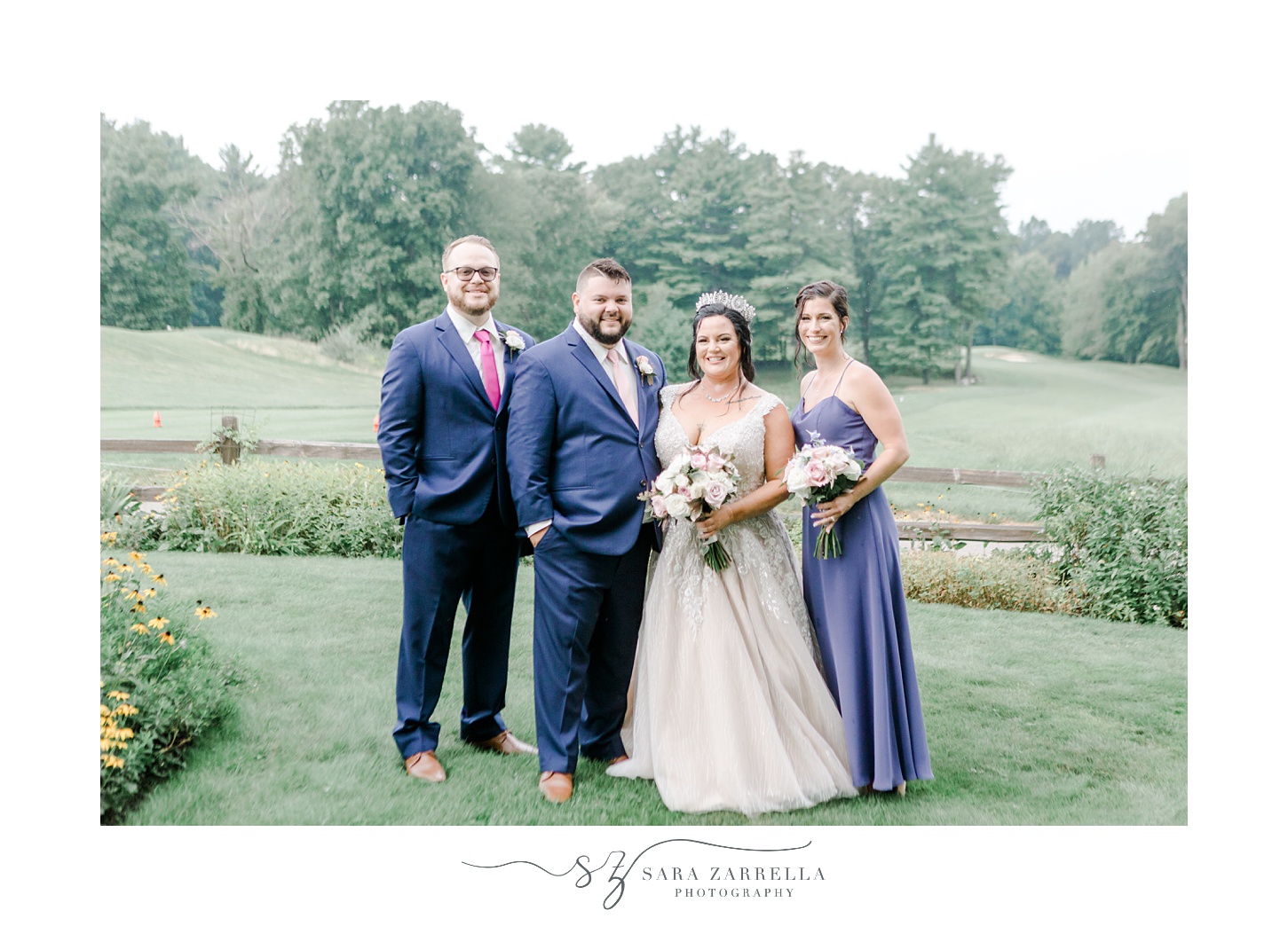 bride and groom pose with maid of honor and groom on lawn at Blissful Meadows