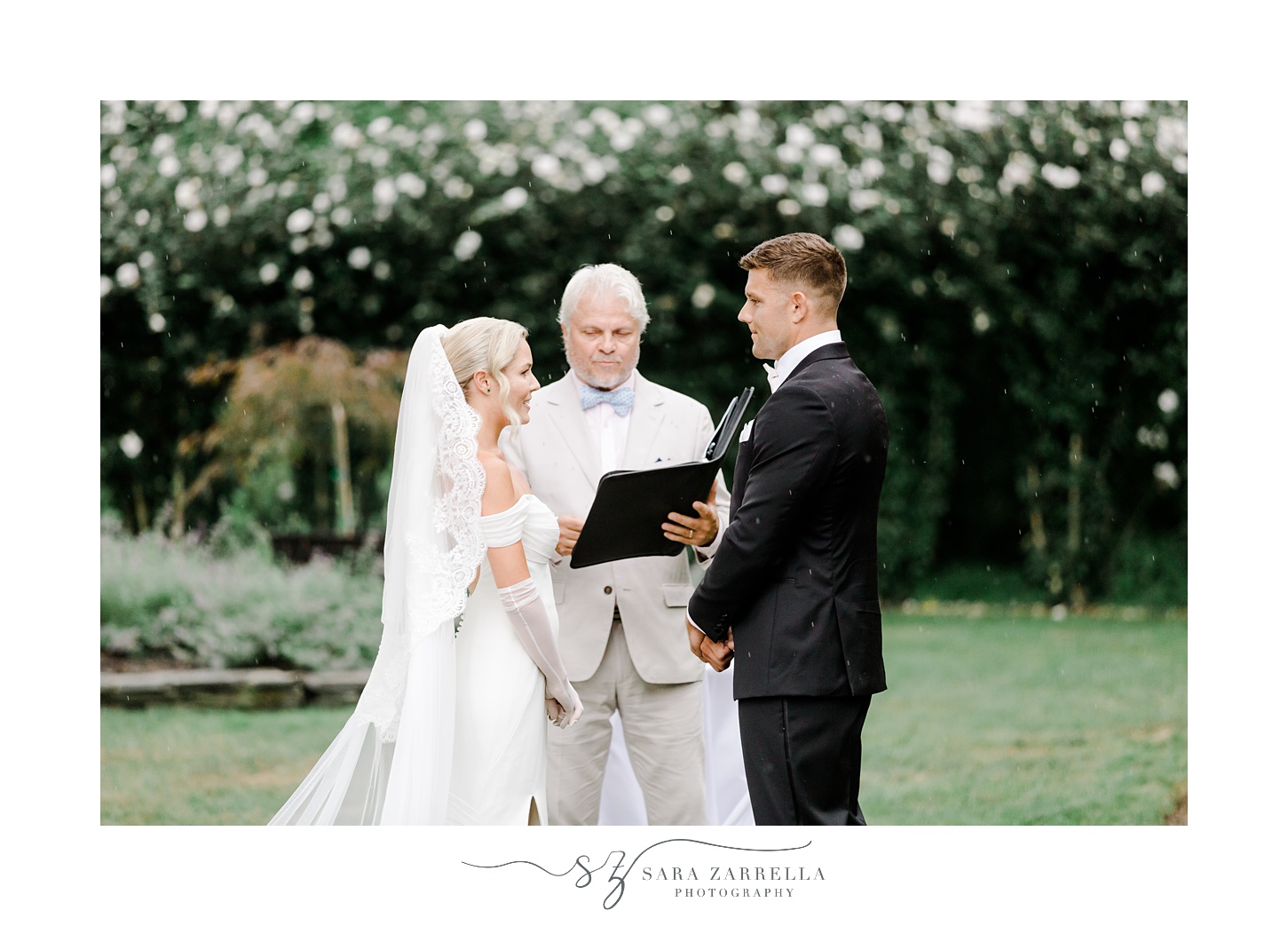 bride and groom exchange vows during drizzle at Glen Manor House