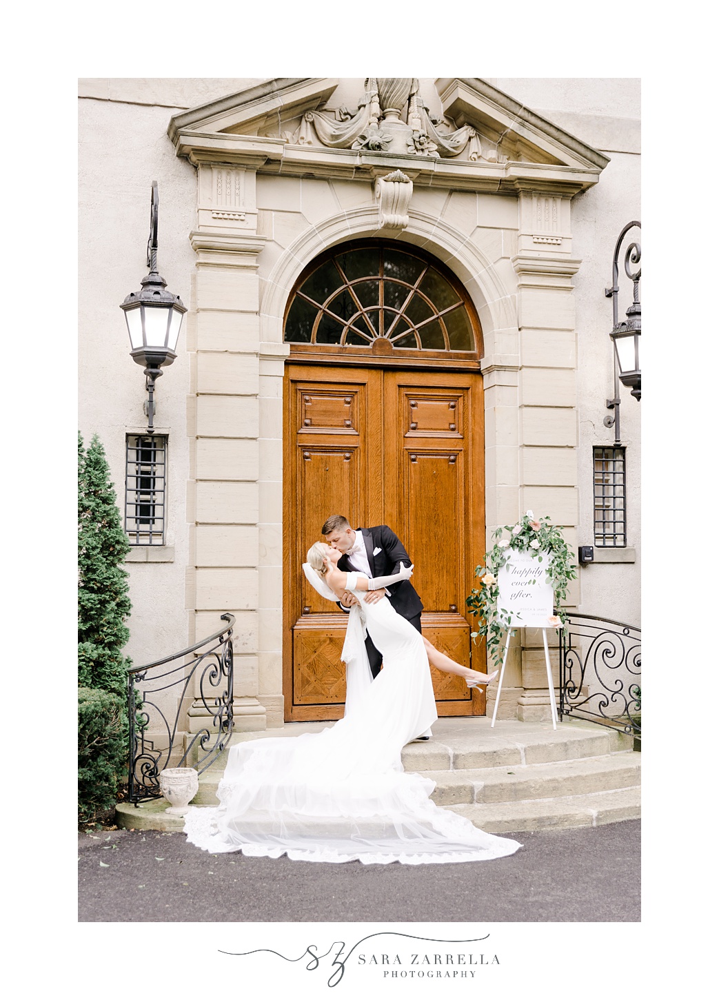 newlyweds kiss dipping on staircase outside Glen Manor House