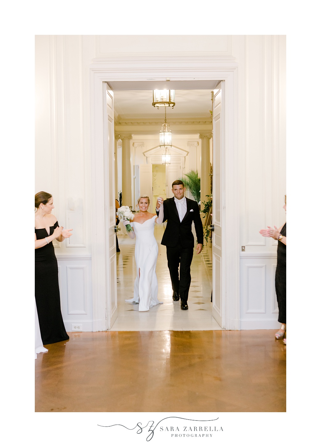 bride and groom enter wedding reception at Glen Manor House