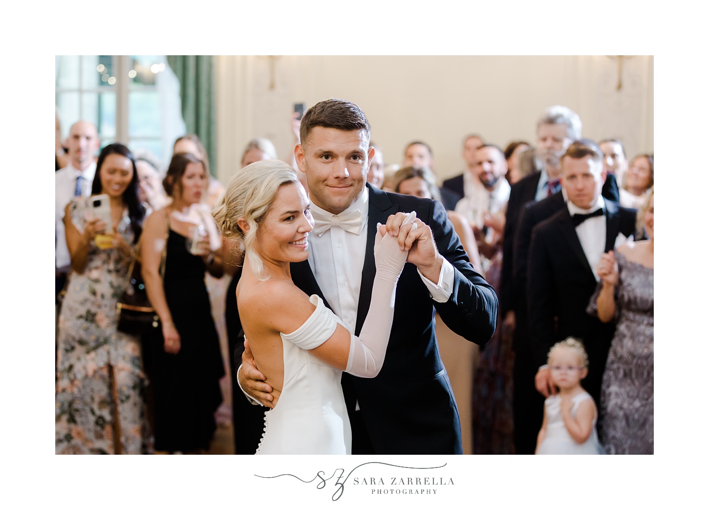 bride and groom dance together at Portsmouth RI wedding recption