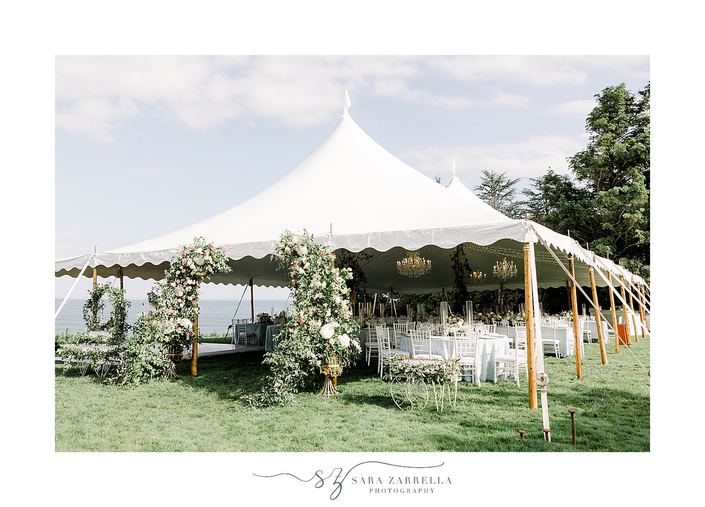 white tent on lawn at the Chanler for wedding reception 