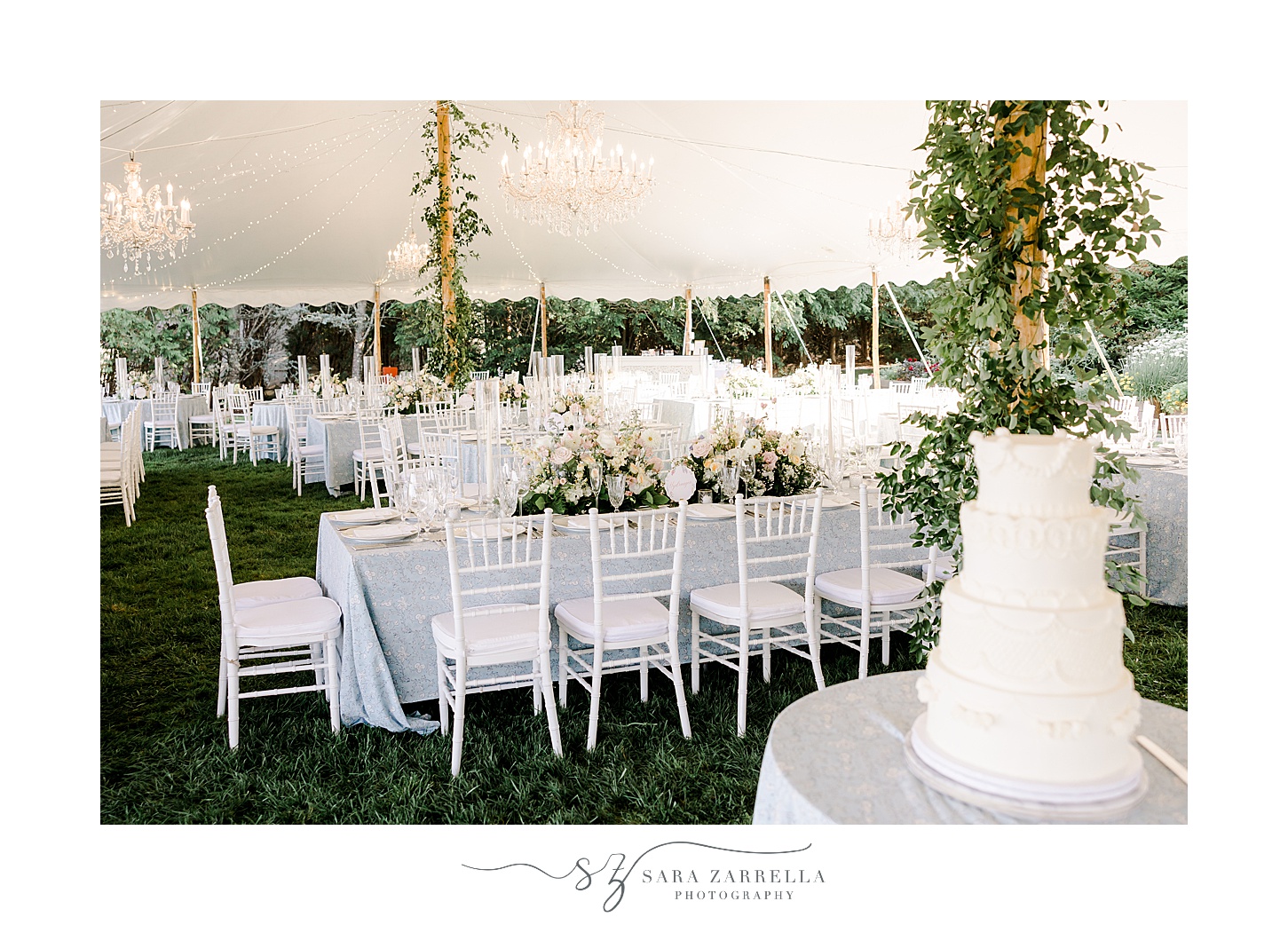 wedding reception under tent at the Chanler with blue table cloth