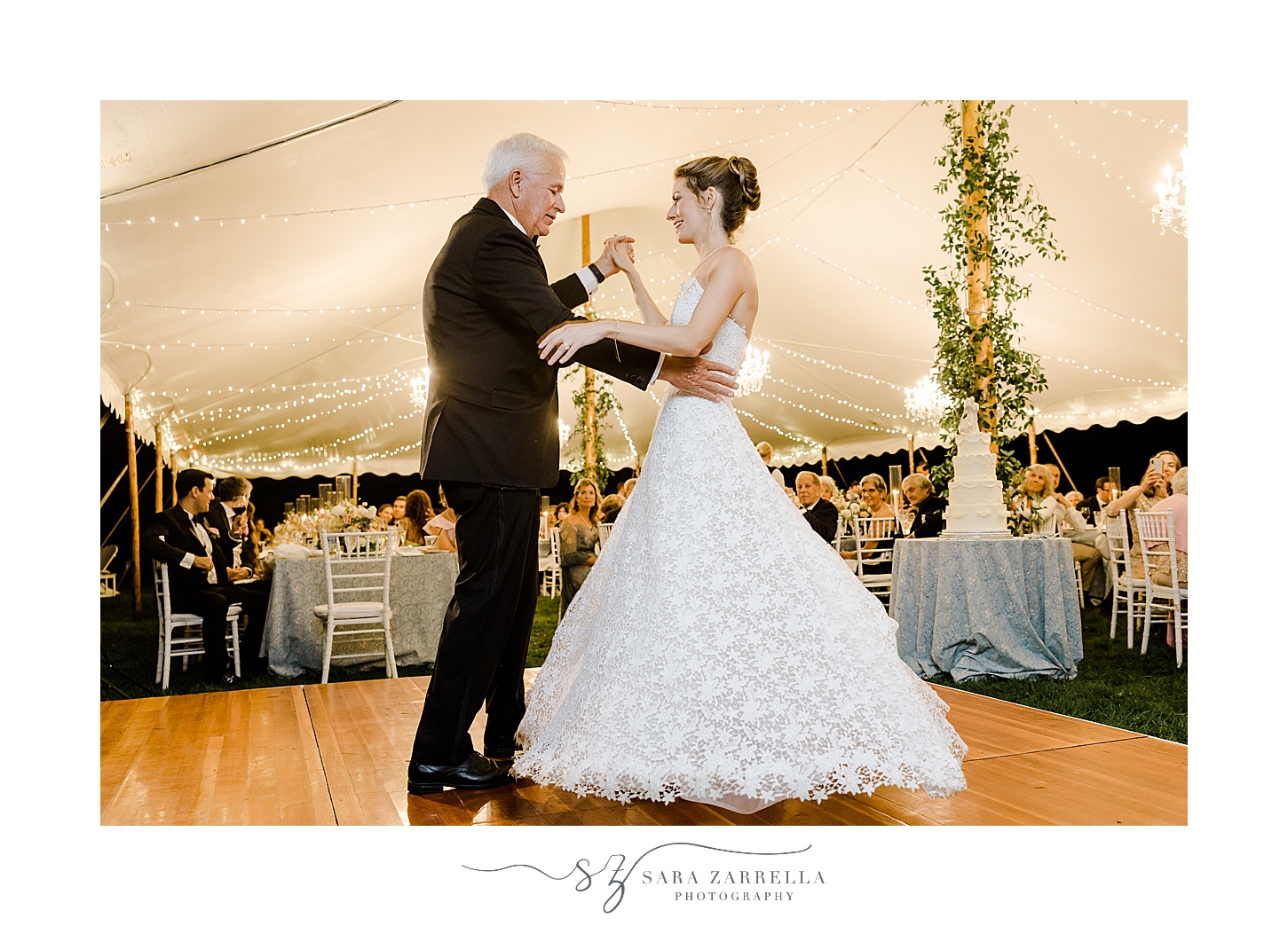 bride and father dance under tent on dance floor at the Chanler