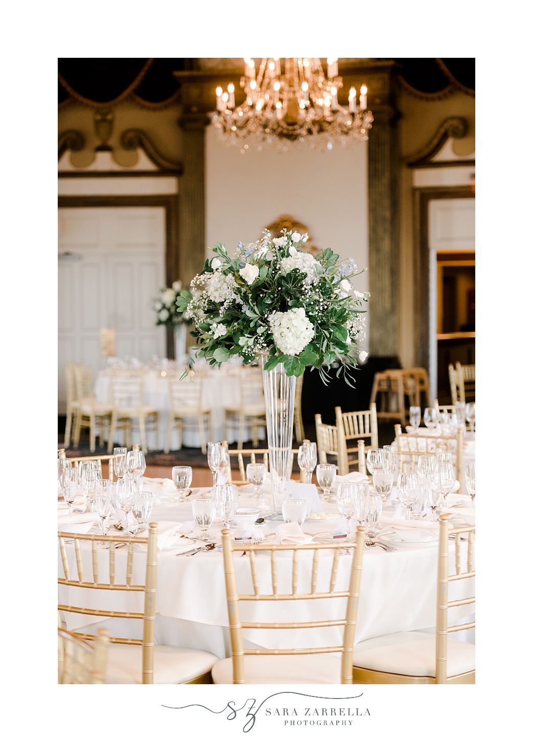 tall floral centerpiece with white flowers at summer reception inside the Graduate Providence
