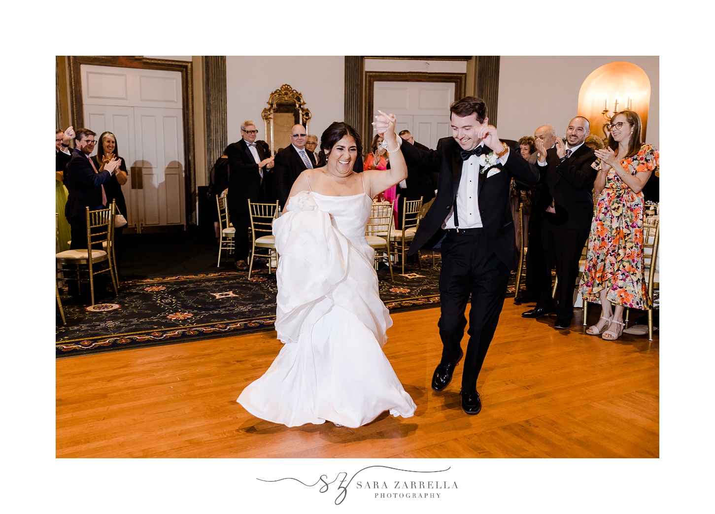 groom twirls bride on dance floor at the Graduate Providence