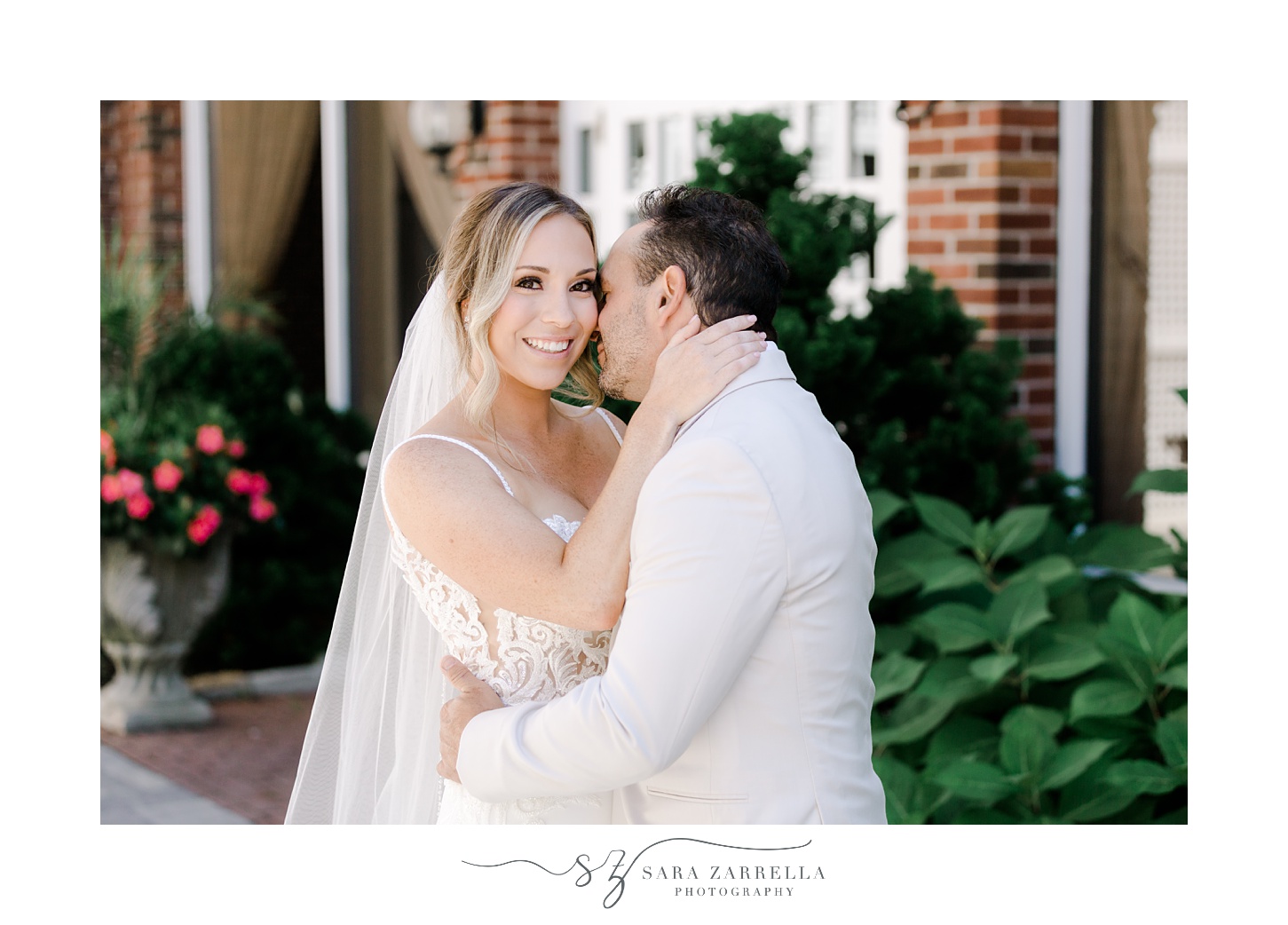 groom leans to nuzzle bride's cheek during portraits in Rhode Island 