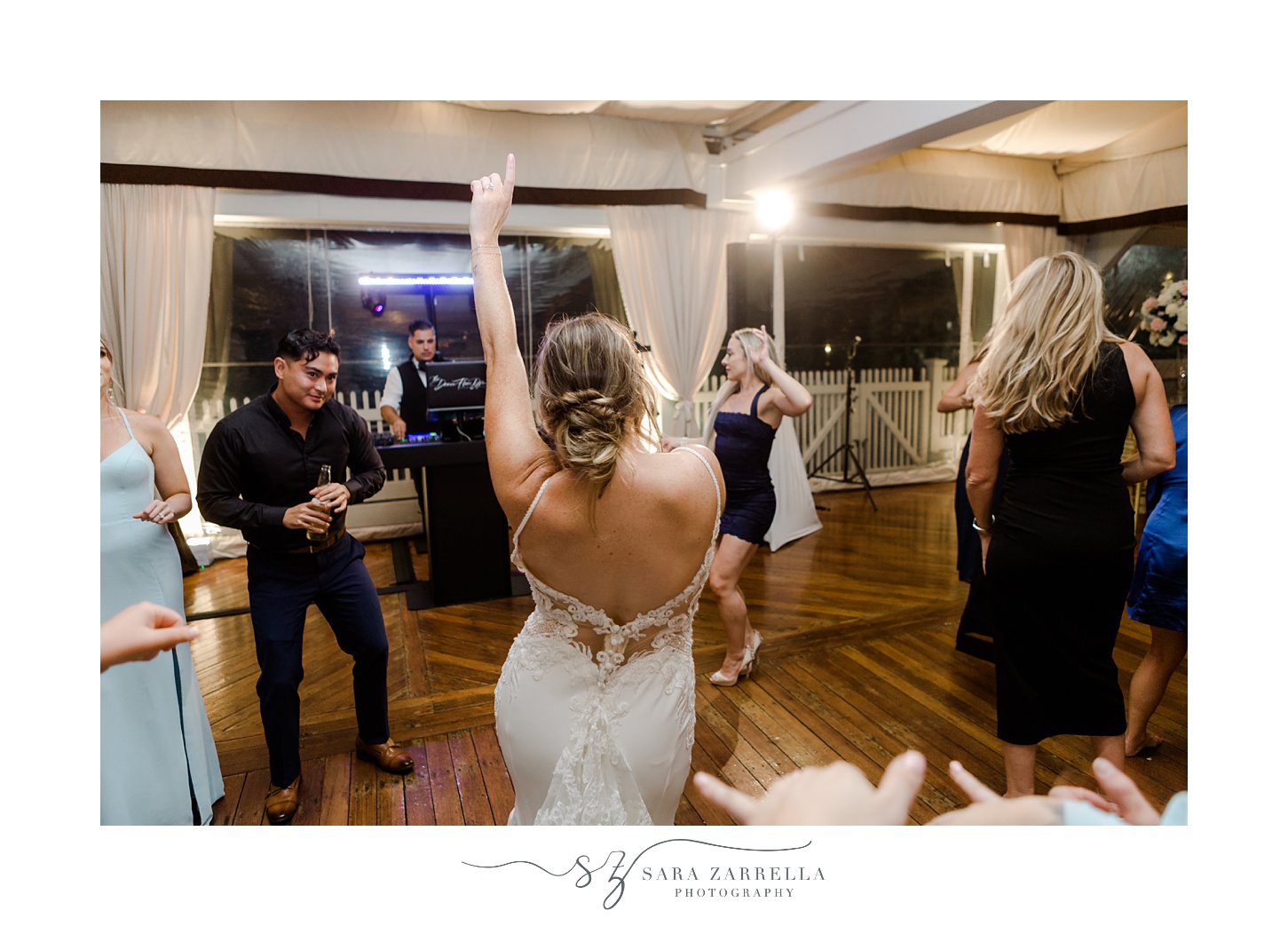 bride dances during Newport RI wedding reception