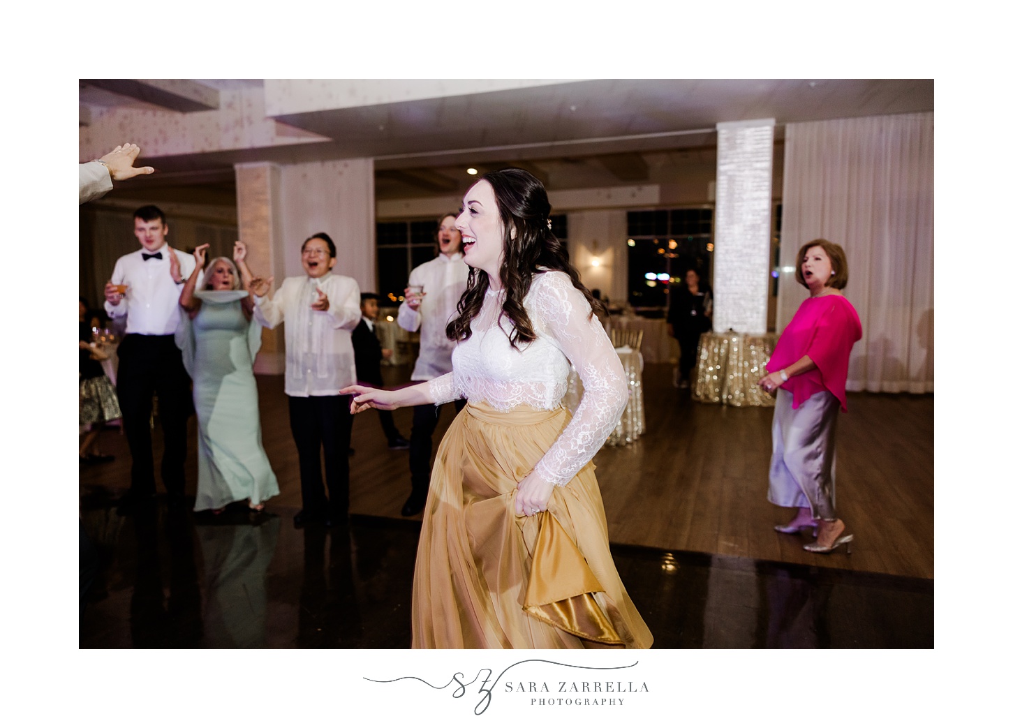 bride dances during Rhode Island wedding reception 