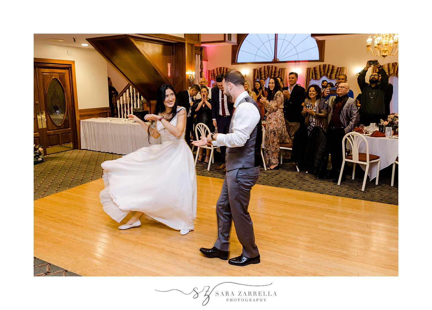 bride and groom dance during reception at Jacky's Galaxie
