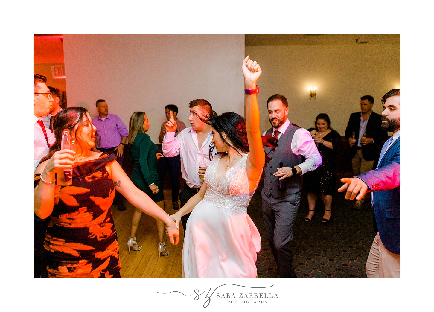 guests dance during wedding reception at Jacky's Galaxie