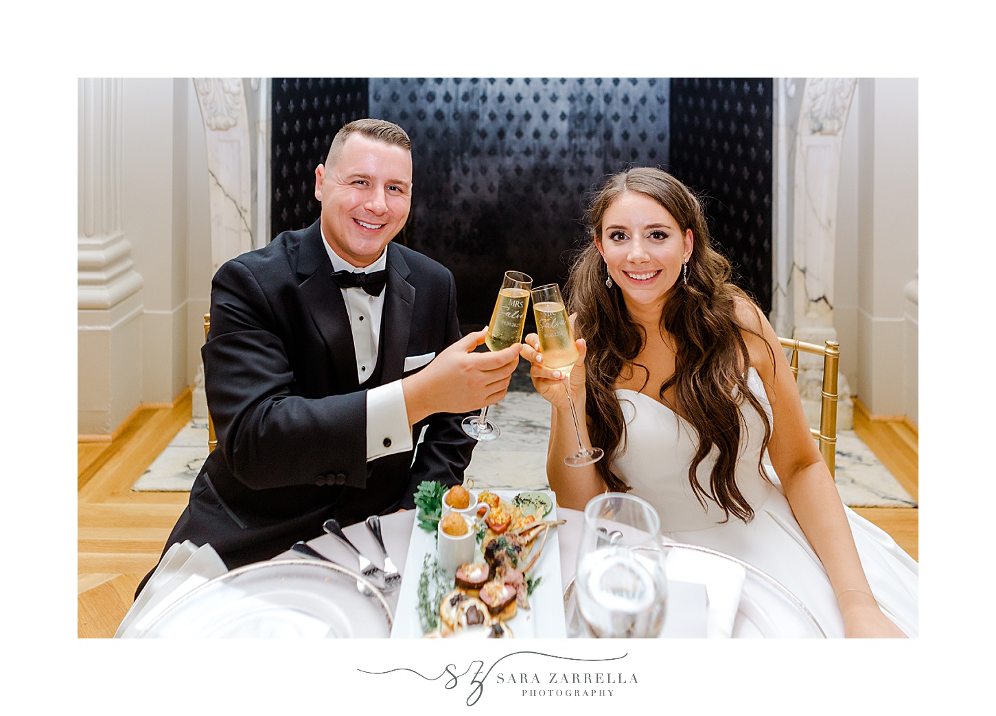 bride and groom toast champagne during Newport RI wedding reception