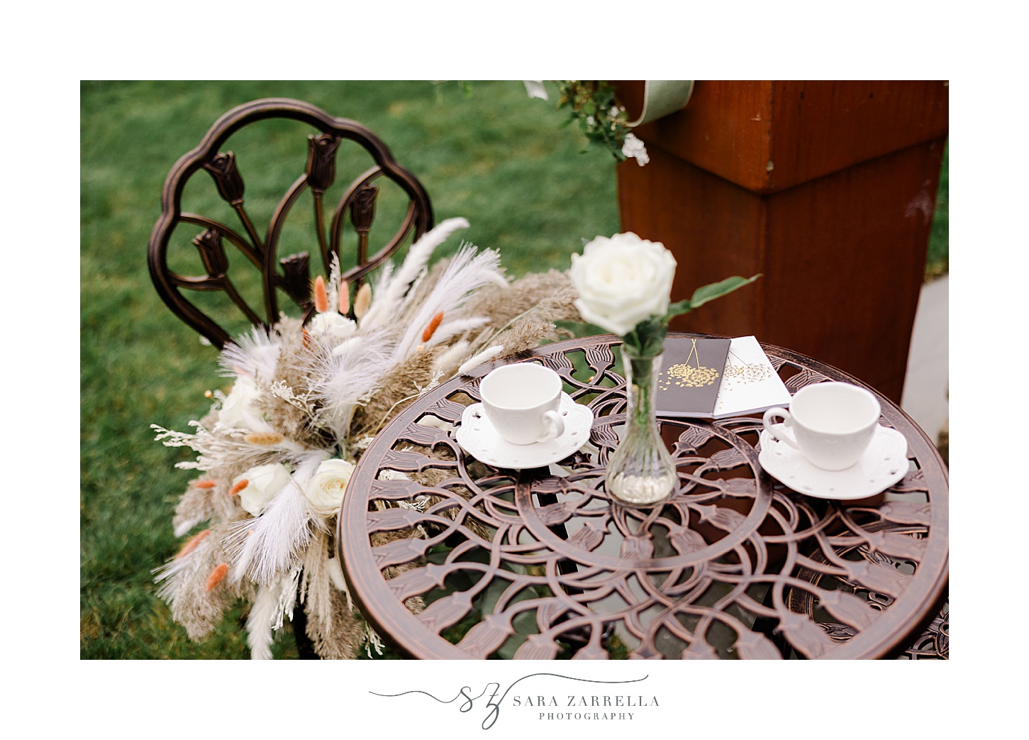 tea setup on metal table outside private Rhode Island home