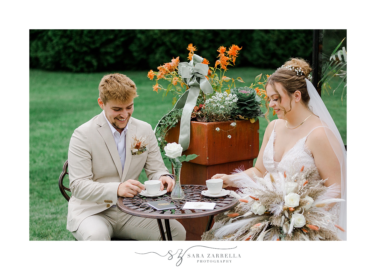 bride and groom have tea on wedding day by greenhouse