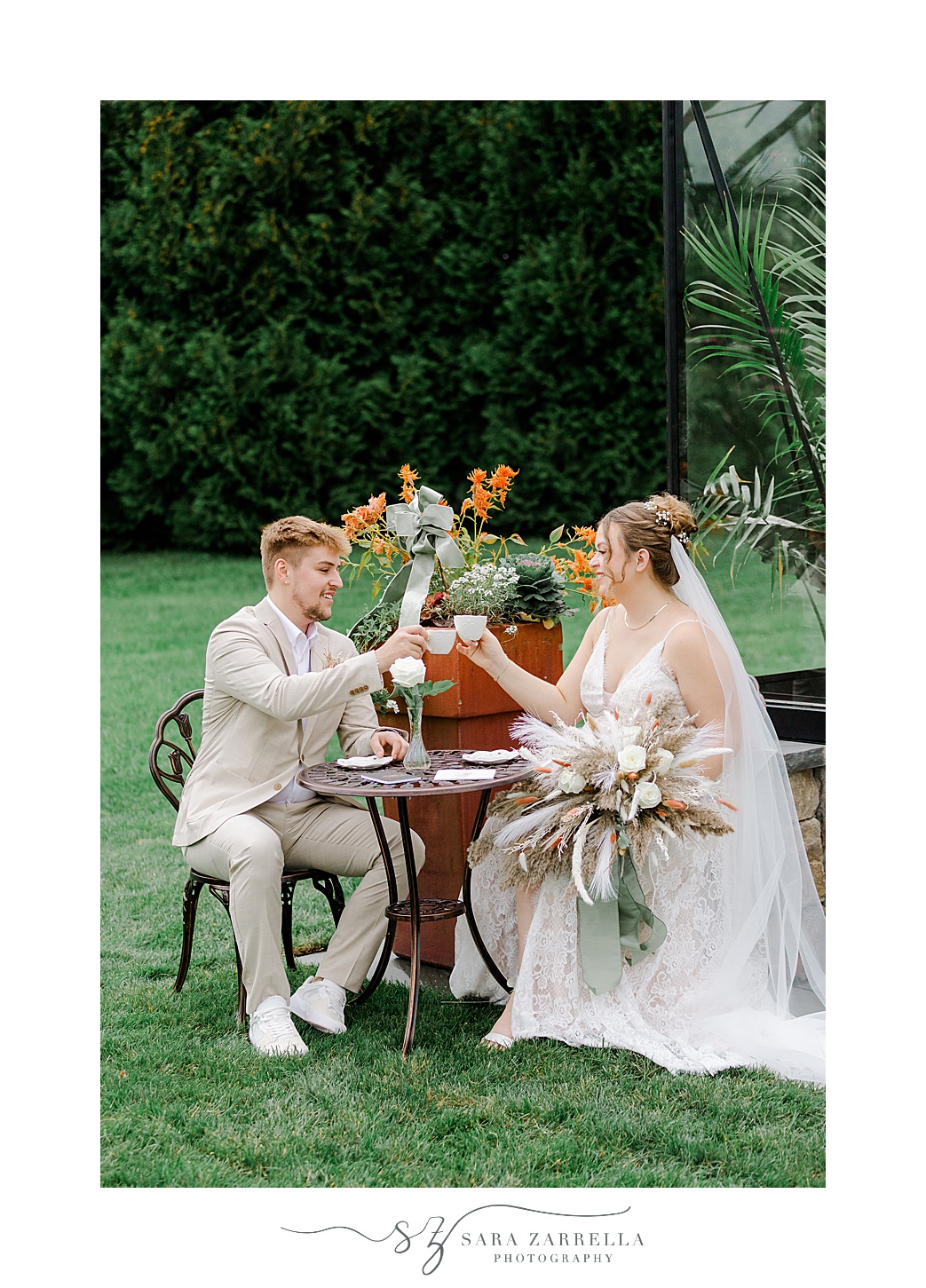 newlyweds drink tea together on morning of Rhode Island wedding