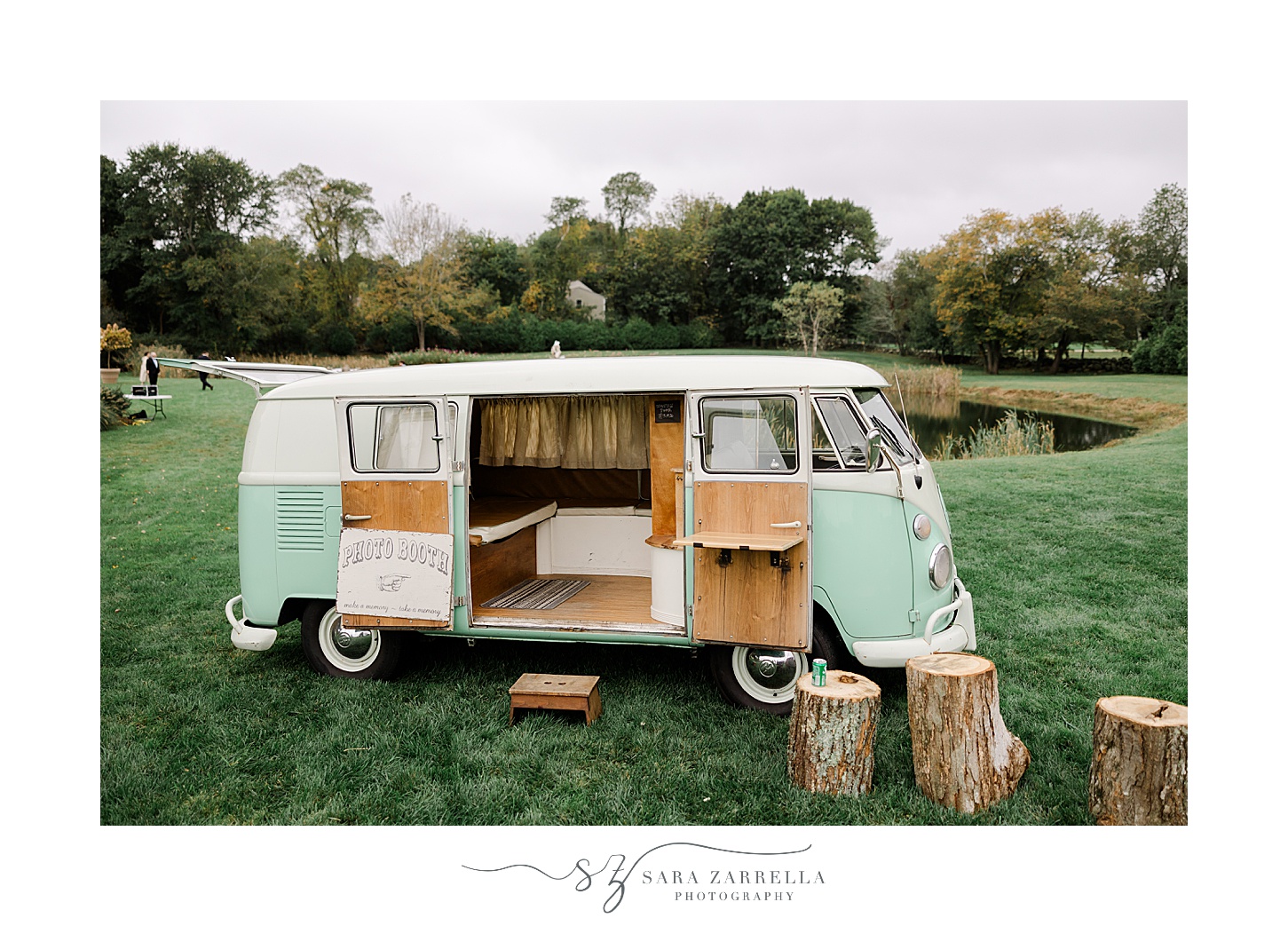 teal and white VW bus photo booth on lawn