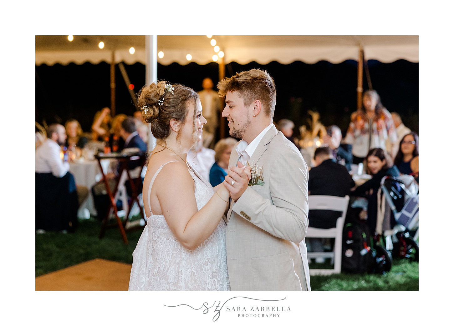 newlyweds dance during Rhode Island wedding reception under tent
