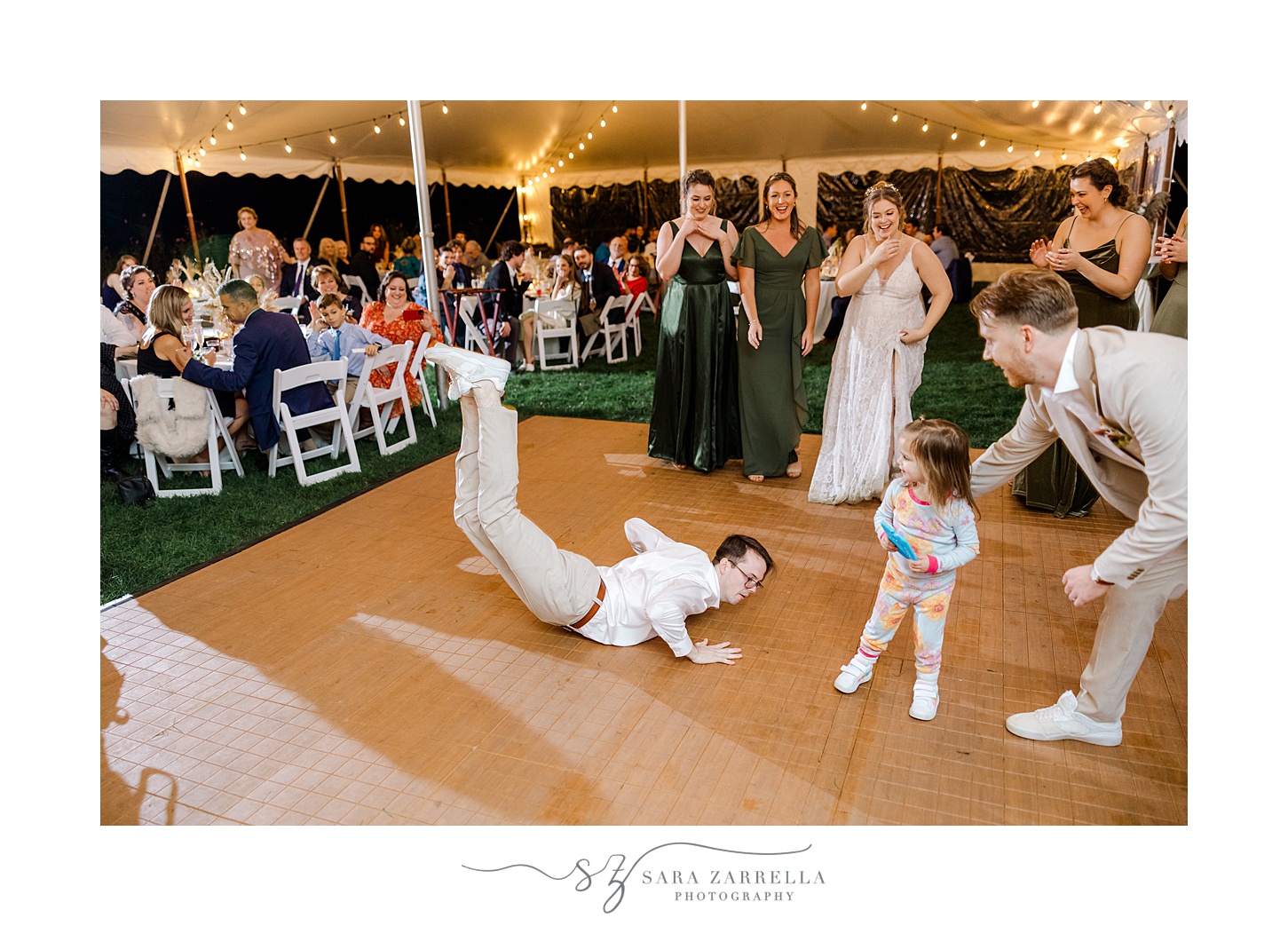 guest does the worm during Rhode Island wedding reception