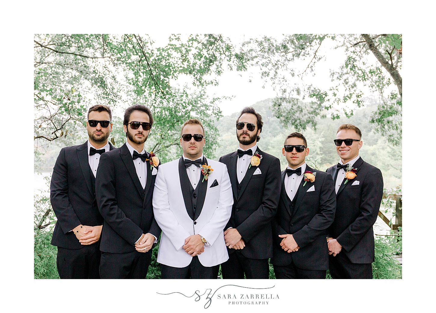 groom and groomsmen pose with sunglasses on before Westerly RI wedding day