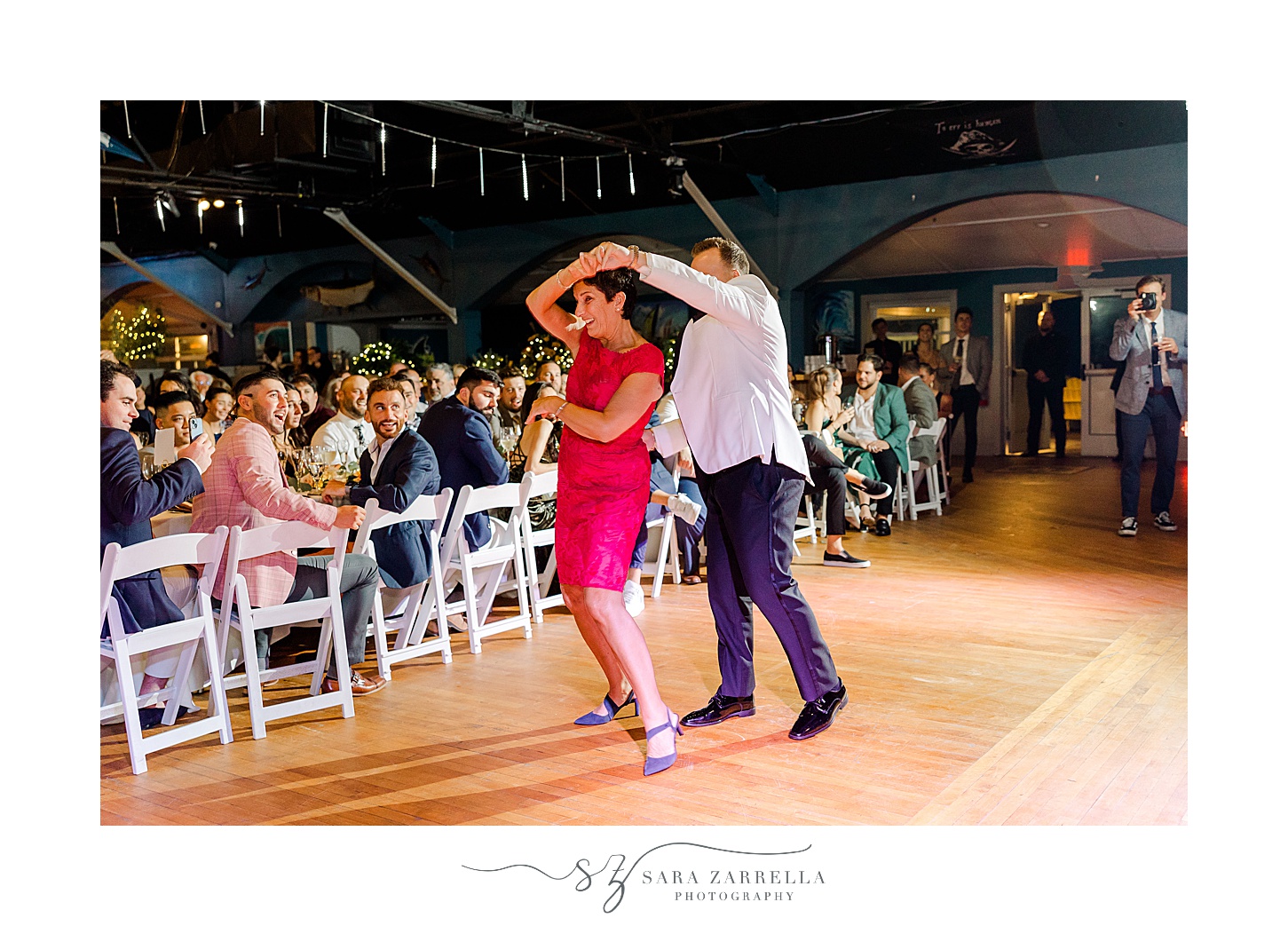 groom and mother dance during wedding reception at the Windjammer