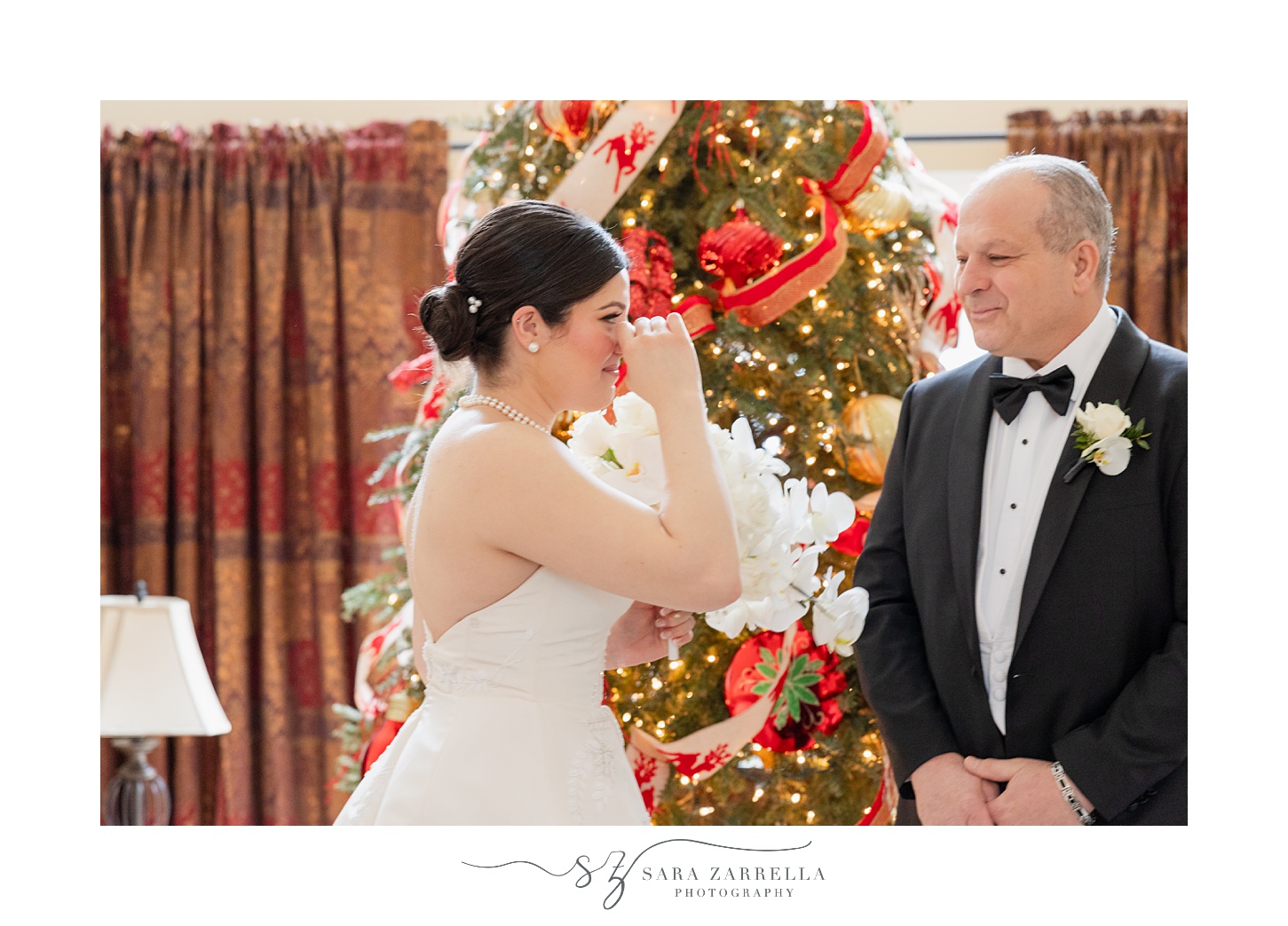 bride cries wiping away tears during first look with dad 