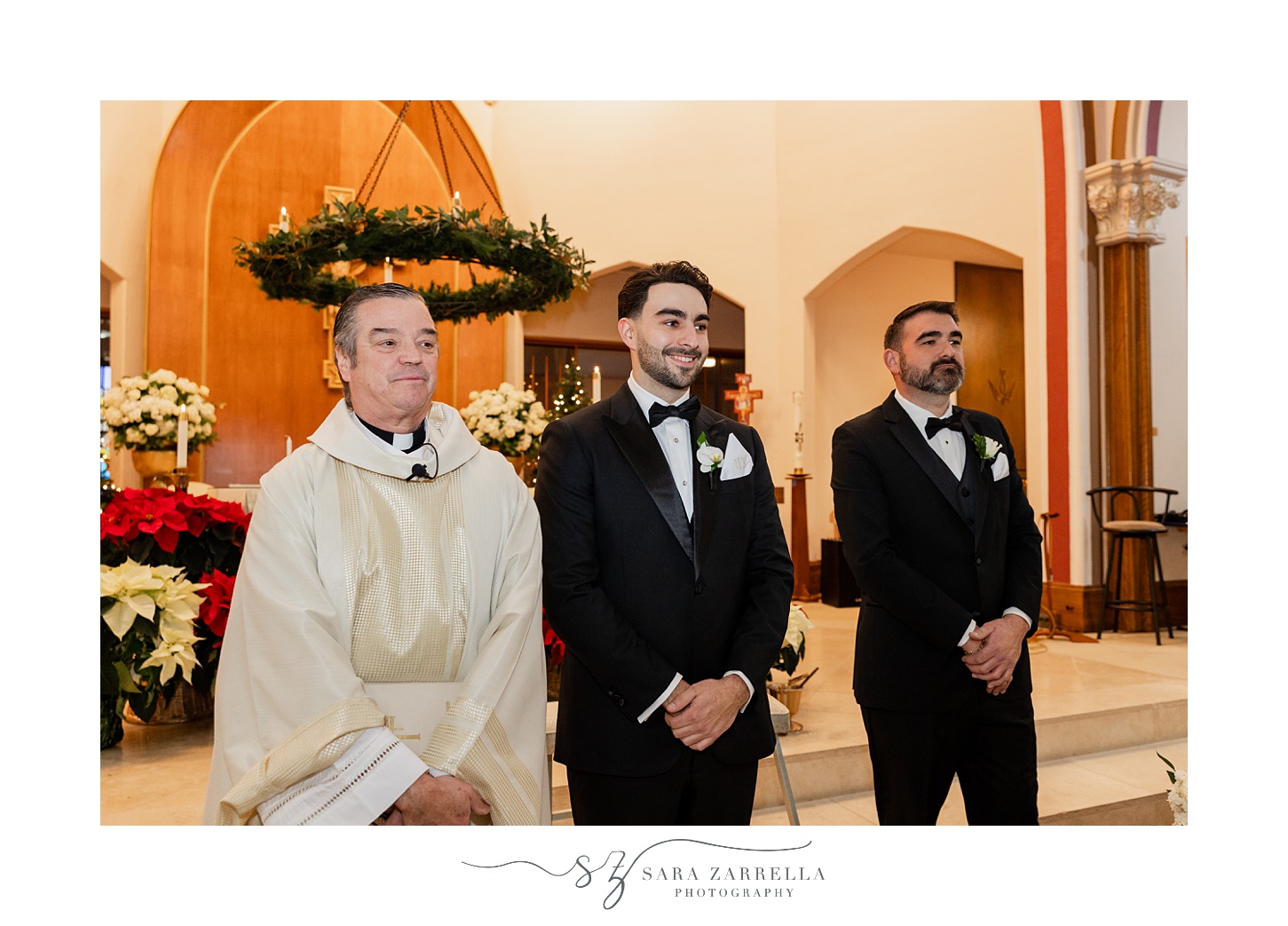 groom watches bride walk down aisle at St. Thomas Church in Providence RI