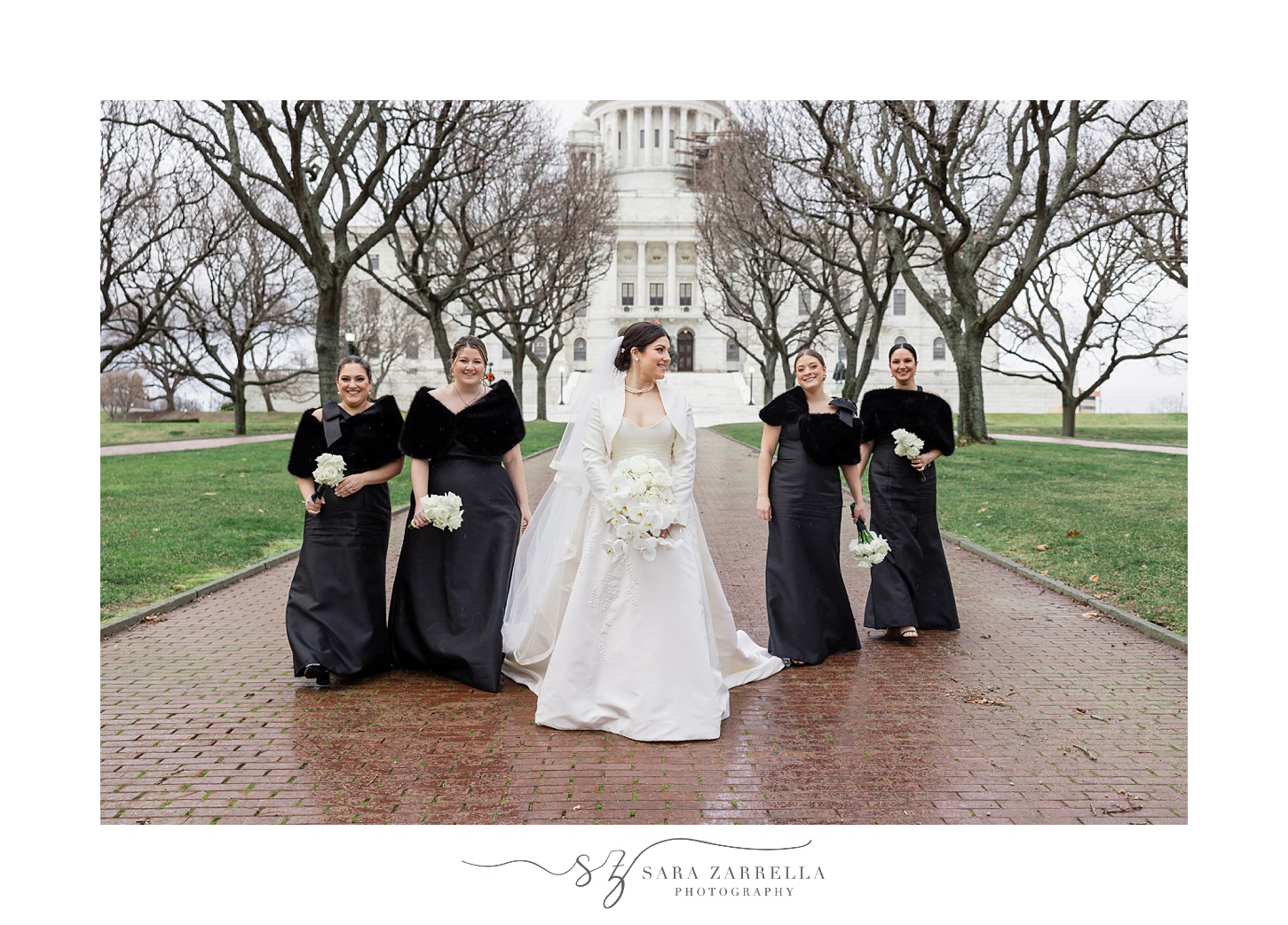 bride and bridesmaids walk outside the RI State House