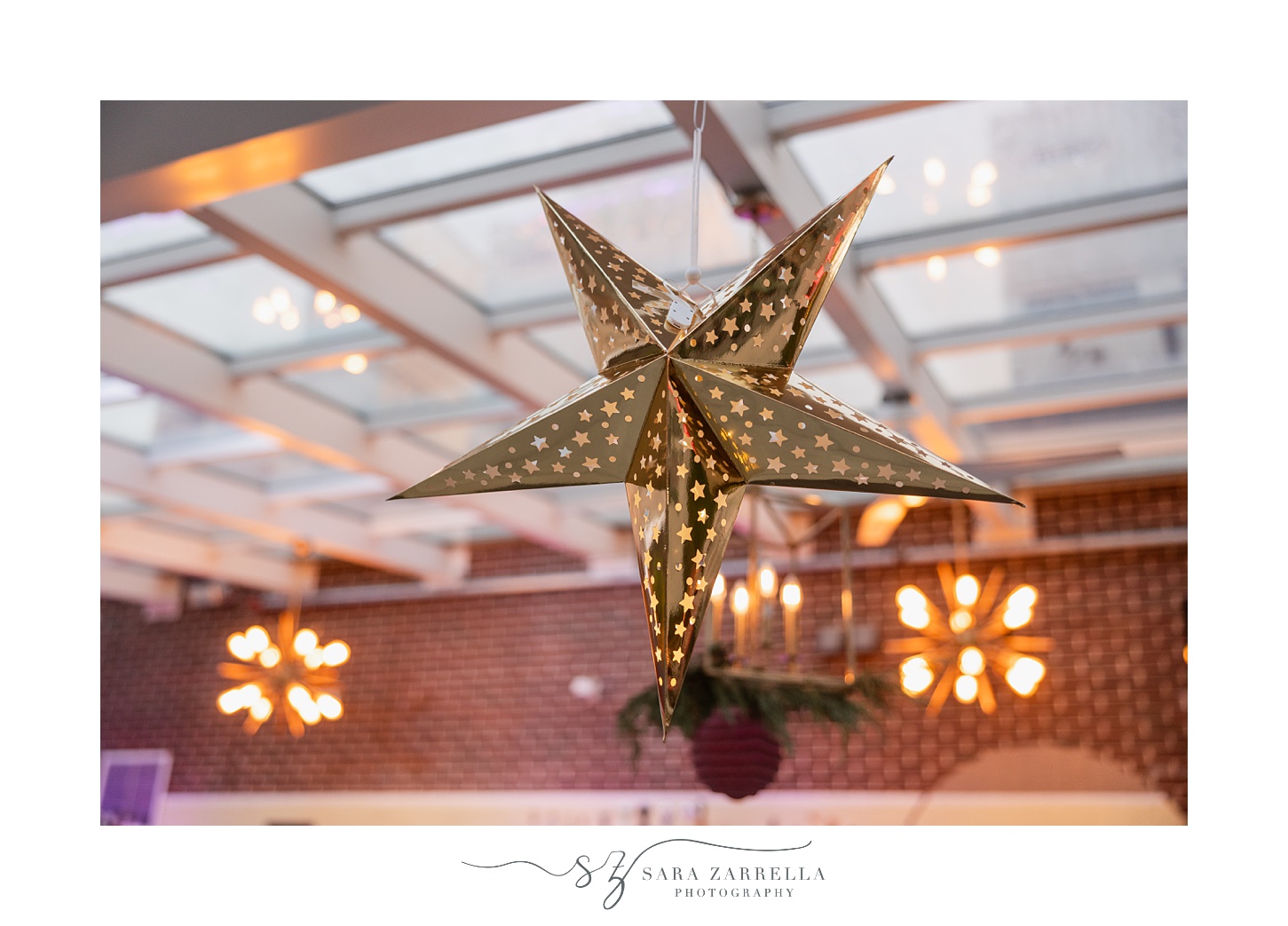 gold star hangs from glass ceiling at the Providence G