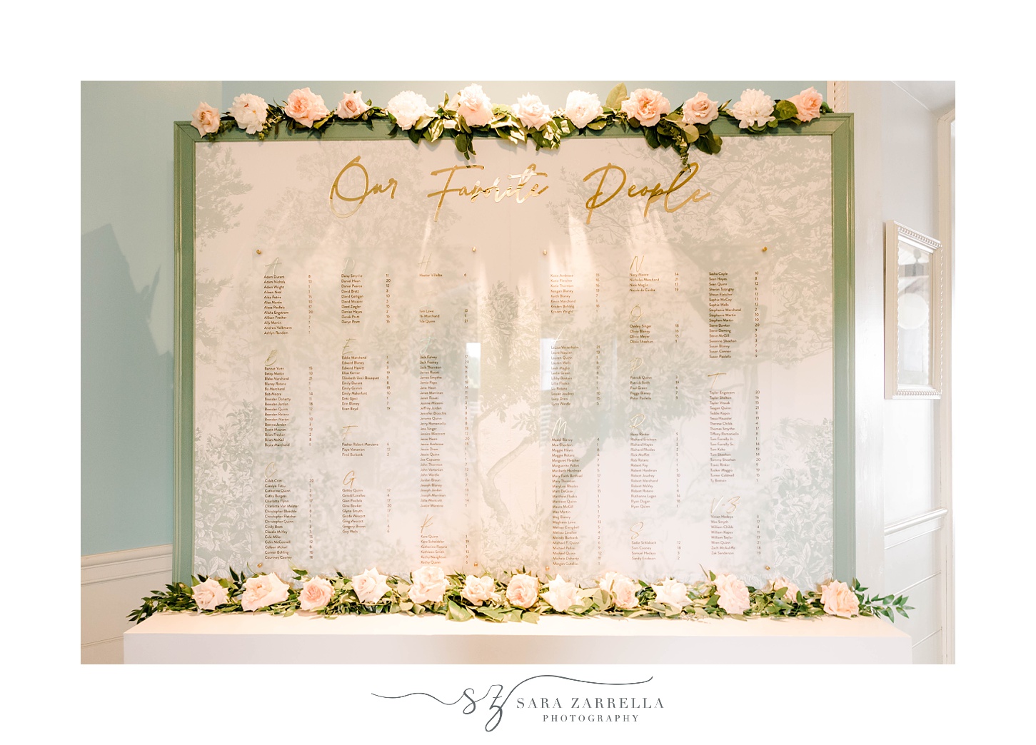 seating chart with gold lettering for the Dunes Club wedding reception 